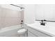 Bathroom featuring tile accents, soaking tub, and modern fixtures at 7637 W Minton St, Laveen, AZ 85339