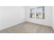 Bright, carpeted bedroom with neutral tones and window at 7637 W Minton St, Laveen, AZ 85339