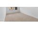 Neutral bedroom featuring carpet floors and a window with blinds at 7641 W Minton St, Laveen, AZ 85339
