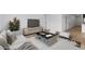 Stylishly furnished living room featuring a comfortable sectional, unique coffee table, and wood-look floors at 7641 W Minton St, Laveen, AZ 85339