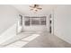 Bright bedroom with bay window and ceiling fan at 8411 W Myrtle Ave, Glendale, AZ 85305