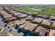 Wide aerial showcasing the community, golf course, and home's location at 1351 E Artemis Trl, Queen Creek, AZ 85140