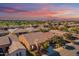 Aerial view of a luxury home community with mountain views and golf course at 1351 E Artemis Trl, Queen Creek, AZ 85140