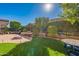 Artificial turf lawn with patio and fire pit at 1351 E Artemis Trl, Queen Creek, AZ 85140