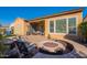 Backyard with fire pit and patio seating at 1351 E Artemis Trl, Queen Creek, AZ 85140