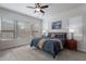 Bright bedroom with a king-size bed and large windows at 1351 E Artemis Trl, Queen Creek, AZ 85140