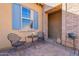 Cozy patio with wrought iron chairs and a small table at 1351 E Artemis Trl, Queen Creek, AZ 85140