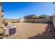 Backyard with gravel, shed, and AC unit at 1435 E Debbie Dr, San Tan Valley, AZ 85140
