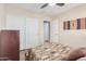 Spacious bedroom with double bed and built-in closet at 1435 E Debbie Dr, San Tan Valley, AZ 85140