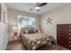 Bright bedroom with a double bed and ample closet space at 1435 E Debbie Dr, San Tan Valley, AZ 85140