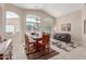 Spacious dining area with a large table and seating for six at 1435 E Debbie Dr, San Tan Valley, AZ 85140