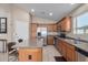 Updated kitchen with stainless steel appliances and island at 1435 E Debbie Dr, San Tan Valley, AZ 85140