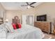 Main bedroom with a comfortable bed and plenty of closet space at 1435 E Debbie Dr, San Tan Valley, AZ 85140