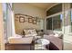 Relaxing covered patio with wicker furniture at 1435 E Debbie Dr, San Tan Valley, AZ 85140