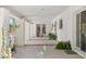 Covered patio with ample space for seating and decor, offering a serene outdoor living area with mature landscaping at 1440 E Secretariat Dr, Tempe, AZ 85284
