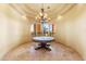 Sunlit dining room with recessed lighting, decorative chandelier, and panoramic outdoor views at 16149 E Thistle Dr, Fountain Hills, AZ 85268