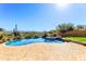 Backyard pool and spa with desert views and brick patio at 16149 E Thistle Dr, Fountain Hills, AZ 85268