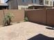 Small backyard with a paved patio and desert landscaping at 1669 S Wallrade Ln, Gilbert, AZ 85295