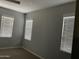 Spacious bedroom with neutral walls and carpet flooring at 1669 S Wallrade Ln, Gilbert, AZ 85295
