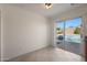 Dining area with tile floor and sliding glass doors to patio at 22814 W Cantilever St, Buckeye, AZ 85326