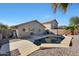 Private backyard oasis featuring a sparkling pool and patio at 22814 W Cantilever St, Buckeye, AZ 85326