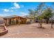 Brick paver backyard with covered patio and AC unit at 2440 W Bloch Rd, Phoenix, AZ 85041