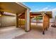Covered patio and spacious brick backyard with storage shed at 2440 W Bloch Rd, Phoenix, AZ 85041