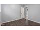 Light and airy bedroom with wood laminate flooring at 2440 W Bloch Rd, Phoenix, AZ 85041