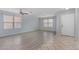 Living room with wood-look floors and a door leading to the exterior at 2440 W Bloch Rd, Phoenix, AZ 85041
