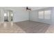 Bright living room with wood-look floors and neutral walls at 2440 W Bloch Rd, Phoenix, AZ 85041