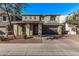 Two-story house with gray exterior, two-car garage, and landscaping at 4486 S Montana Dr, Chandler, AZ 85248