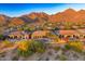 Aerial view of homes with mountain views and community pool at 11157 E Greenway Rd, Scottsdale, AZ 85255