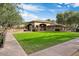 Community BBQ area with lawn, pathway and mountain views at 11157 E Greenway Rd, Scottsdale, AZ 85255