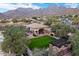 Community BBQ area with pergola, lawn, and mountain views at 11157 E Greenway Rd, Scottsdale, AZ 85255