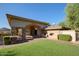 Community BBQ area with grills and seating under covered patio at 11157 E Greenway Rd, Scottsdale, AZ 85255