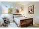 Cozy bedroom with wood flooring and window seat at 11157 E Greenway Rd, Scottsdale, AZ 85255