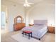 Spacious Primary bedroom with plush carpet and ensuite bathroom access at 11157 E Greenway Rd, Scottsdale, AZ 85255