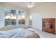 Bright bedroom with backyard views and patio access at 11157 E Greenway Rd, Scottsdale, AZ 85255