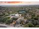 Aerial view of community amenities including pool, clubhouse, and tennis court at 11157 E Greenway Rd, Scottsdale, AZ 85255
