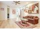 Living room with hardwood floors and comfortable seating at 11157 E Greenway Rd, Scottsdale, AZ 85255