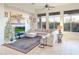 Living room boasts a sectional sofa and large windows with scenic views at 11157 E Greenway Rd, Scottsdale, AZ 85255