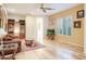 Cozy living room with hardwood floors and built-in shelving at 11157 E Greenway Rd, Scottsdale, AZ 85255