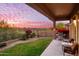 Covered patio with built-in grill and seating area at 11157 E Greenway Rd, Scottsdale, AZ 85255