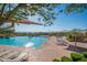 Community pool with lounge chairs and mountain views at 11157 E Greenway Rd, Scottsdale, AZ 85255