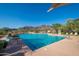 Sparkling community pool with mountain backdrop at 11157 E Greenway Rd, Scottsdale, AZ 85255