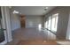 Spacious living room with tile floors and sliding glass doors at 12519 W Krall Ct, Glendale, AZ 85307