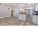 Kitchen with white cabinets and granite countertops at 13624 W Aleppo Dr, Sun City West, AZ 85375