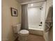 Clean bathroom featuring a tub shower combo at 1745 E Glade Ave, Mesa, AZ 85204