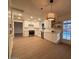 Modern kitchen with white cabinets and stainless steel appliances at 1745 E Glade Ave, Mesa, AZ 85204