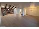 Open concept living and dining area with hardwood floors at 1745 E Glade Ave, Mesa, AZ 85204